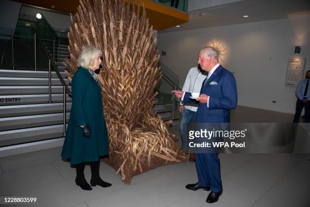 Prince Charles, Prince of Wales and Camilla, Duchess of Cornwall are shown "The Willow Throne" which was made by local man Bob Johnson to imitate the...