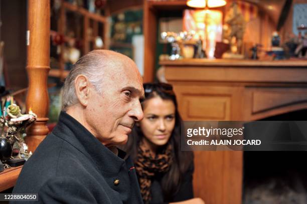 French actor Guy Marchand poses with his wife Adelina on August 28, 2011 in the French central city of Chanceau-pres-Loches as he takes part in the...