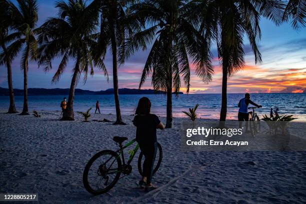 Boracay Island, PHILIPPINES Visitors flock to a beach on September 30, 2020 in Boracay Island, Philippines. The Philippines is reopening Boracay...