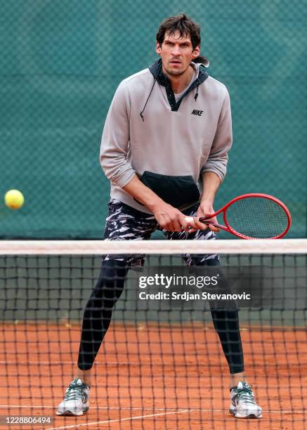 Dallas Mavericks player Boban Marjanovic plays a tennis match at Novak Sports center on September 30, 2020 in Belgrade, Serbia.