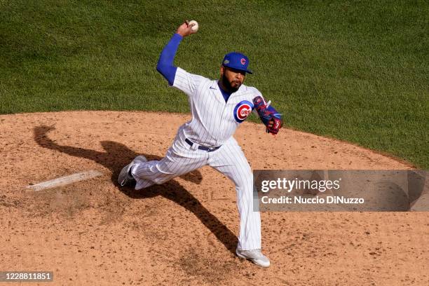 Jeremy Jeffress of the Chicago Cubs pitches during Game 1 of the Wild Card Series between the Miami Marlins and the Chicago Cubs at Wrigley Field on...