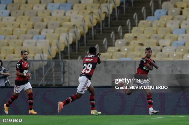 Brazil's Flamengo forward Bruno Henrique celebrates his goal during their closed-door Copa Libertadores group phase football match against Ecuador's...