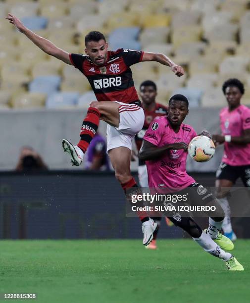 Brazil's Flamengo midfielder Thiago Maia and Ecuador's Independiente del Valle player Moises Caicedo vie for the ball during their closed-door Copa...