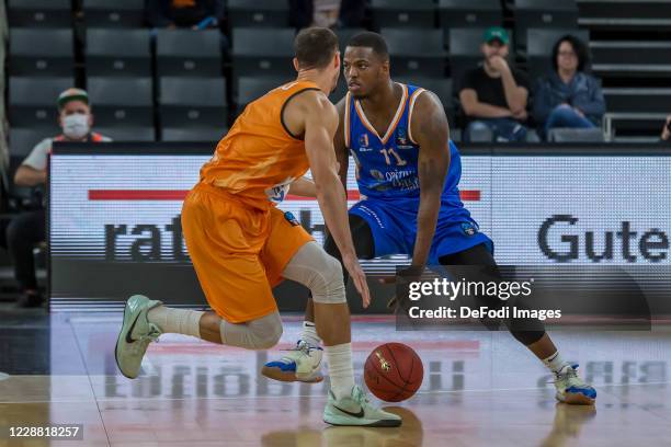 John Petrucelli of ratiopharm ulm and Isaiah Whitehead of Mornar Bar battle for the ball during the Euro Cup between Ratiopharm Ulm and Mornar Bar at...