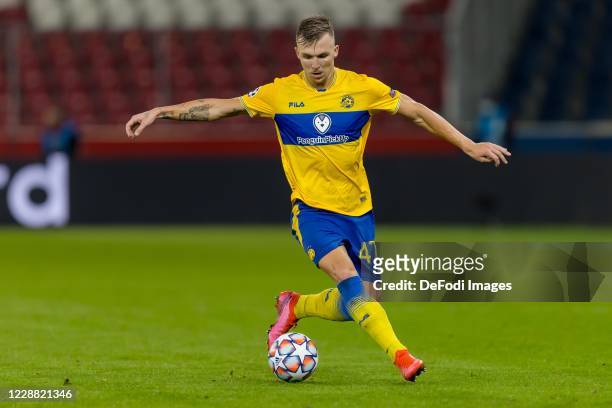 Eden Karzev of Maccabi Tel-Aviv FC controls the ball during the UEFA Champions League Play-Off second leg match between RB Salzburg and Maccabi...