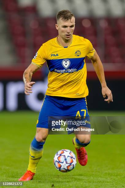 Eden Karzev of Maccabi Tel-Aviv FC controls the ball during the UEFA Champions League Play-Off second leg match between RB Salzburg and Maccabi...