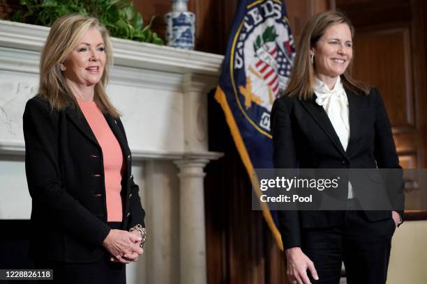 Seventh U.S. Circuit Court Judge Amy Coney Barrett, President Donald Trump's nominee for the U.S. Supreme Court, meets with Sen. Marsha Blackburn as...