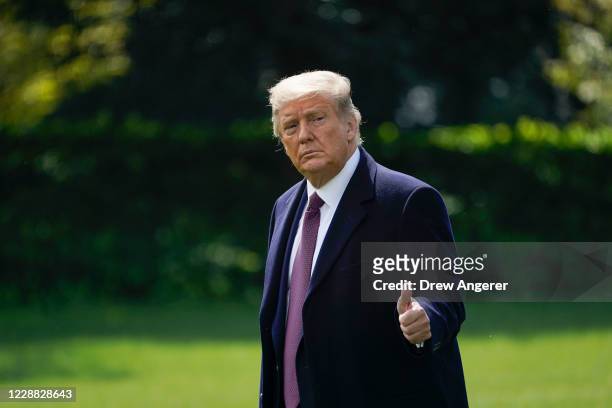 President Donald Trump walks to Marine One on the South Lawn of the White House on October 1, 2020 in Washington, DC. President Trump is traveling to...
