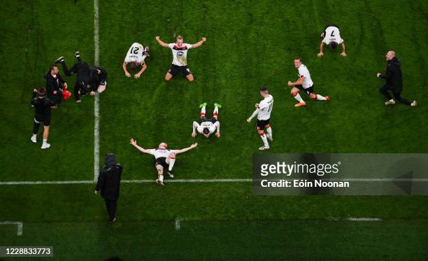 Dublin , Ireland - 1 October 2020; Dundalk players celebrate following their side's victory in the UEFA Europa League Play-off match between Dundalk...