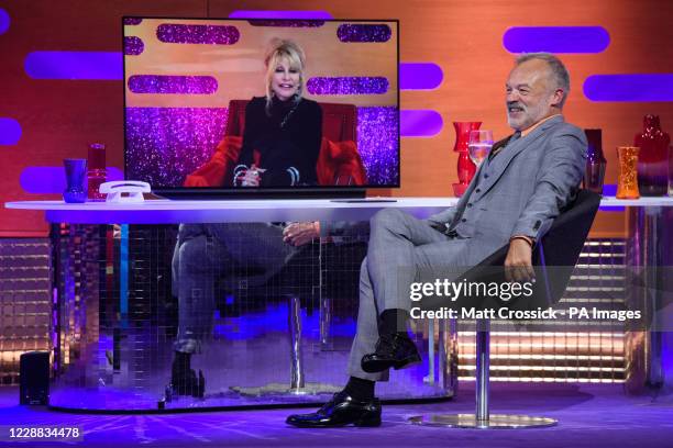 Graham Norton interviews Dolly Parton during the filming for the Graham Norton Show at BBC Studioworks 6 Television Centre, Wood Lane, London, to be...