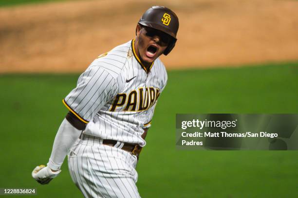 Manny Machado of the San Diego Padres celebrates after hitting a home run in the bottom of the sixth inning against the St Louis Cardinals during...