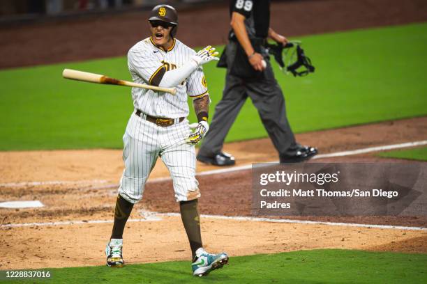 Manny Machado of the San Diego Padres tosses his bat after hitting a home run in the bottom of the sixth inning against the St Louis Cardinals during...