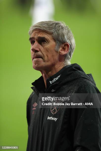 Alan Irvine the assistant head coach / manager of West Ham United who is filling in for David Moyes the head coach / manager of West Ham United who...