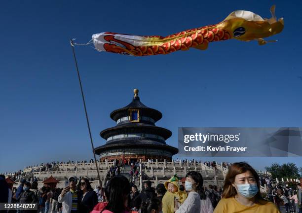 People visit the Temple of Heaven on October 2, 2020 during the national holiday in Beijing, China. China is celebrating its national day marking the...