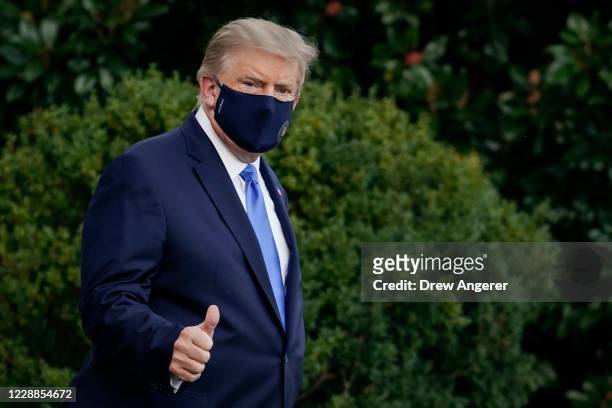 President Donald Trump leaves the White House for Walter Reed National Military Medical Center on the South Lawn of the White House on October 2,...