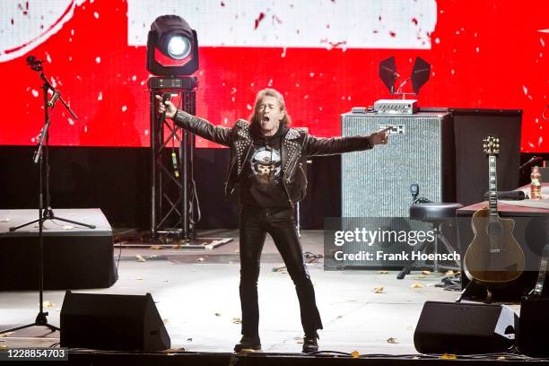 German singer Peter Maffay performs live on stage during a concert at the Waldbuehne on October 2, 2020 in Berlin, Germany.