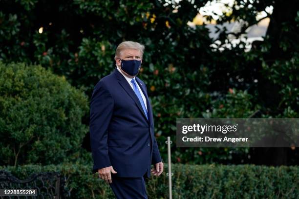 President Donald Trump leaves the White House for Walter Reed National Military Medical Center on the South Lawn of the White House on October 2,...