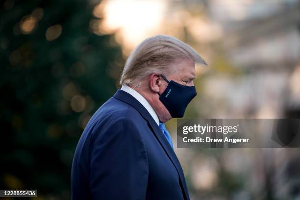 President Donald Trump leaves the White House for Walter Reed National Military Medical Center on the South Lawn of the White House on October 2,...