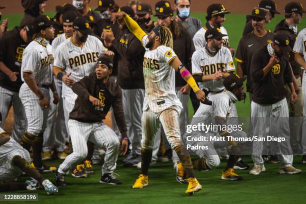 Fernando Tatis Jr celebrates after defeating the St Louis Cardinals during Game Three of the National League Wildcard series at PETCO Park on October...