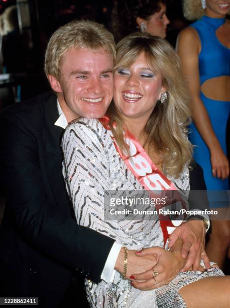 British glamour model Samantha Fox , winner of the Sun newspaper "Page 3 Girl of the Year" event, with comedian Bobby Davro in London, England circa...