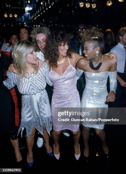 British glamour models including Samantha Fox and Linda Lusardi dancing at the Sun newspaper "Page 3 Girl of the Year" event which was presented by...