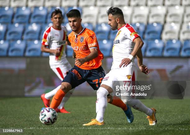 Mete Kaan Demir of Medipol Basaksehir in action against Murat Paluli of Goztepe during the Turkish Super Lig week 4 match between Medipol Basaksehir...
