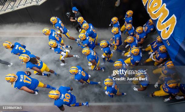 The Pittsburgh Panthers take the field before the start of the game against the North Carolina State Wolfpack at Heinz Field on October 3, 2020 in...