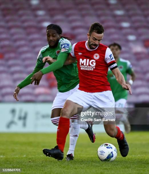 Cork , Ireland - 3 October 2020; Robbie Benson of St Patrick's Athletic in action against Deshane Dalling of Cork City during the SSE Airtricity...