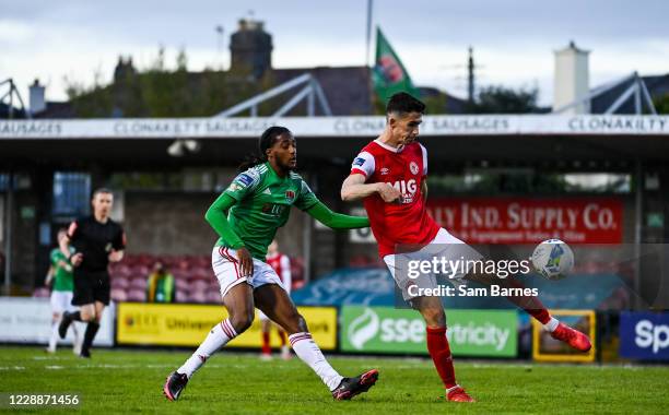 Cork , Ireland - 3 October 2020; Shane Griffin of St Patrick's Athletic in action against Deshane Dalling of Cork City during the SSE Airtricity...