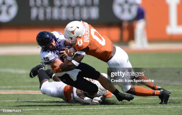 Horned Frogs QB Max Duggan gets tackled by Texas Longhorn LB Demarvion Overshown during game featuring the TCU Horned Frogs and the Texas Longhorns...