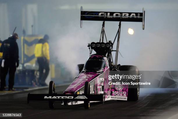 Antron Brown Don Schumacher Racing Matco Tools Top Fuel Dragster does a burnout during qualifying for the Mopar Express Lane NHRA Midwest Nationals...