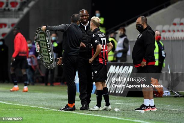 Patrick VIEIRA head coach of Nice and Alexis TROUILLET during the Ligue 1 match between OGC Nice and FC Nantes at Allianz Riviera on October 3, 2020...