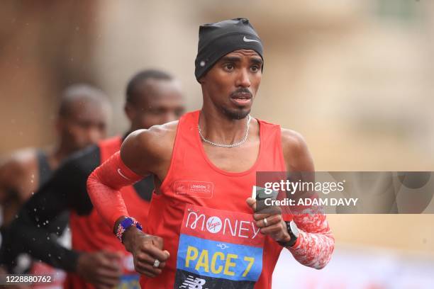 Pacemaker, Britain's Mo Farah runs in the elite men's race of the 2020 London Marathon in central London on October 4, 2020. - This year's London...