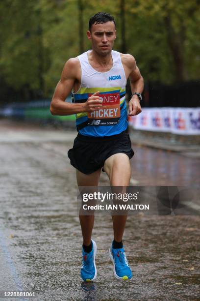 Britain's Adam Hickey runs the elite men's race of the 2020 London Marathon in central London on October 4, 2020. - This year's London marathon, an...