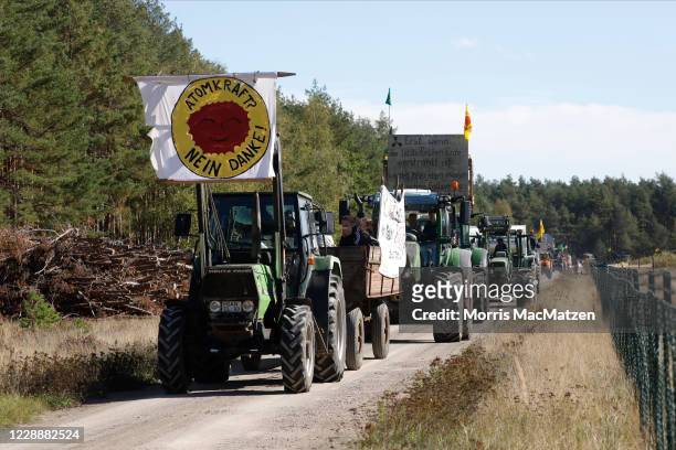 Protesters in tractors march to demand that science takes priority in the search for a new site for storing Germany's nuclear waste outside the...