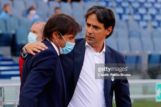 Internazionale head coach Antonio Conte and SS Lazio head coach Simone Inzaghi react during the Serie A match between SS Lazio and FC Internazionale...