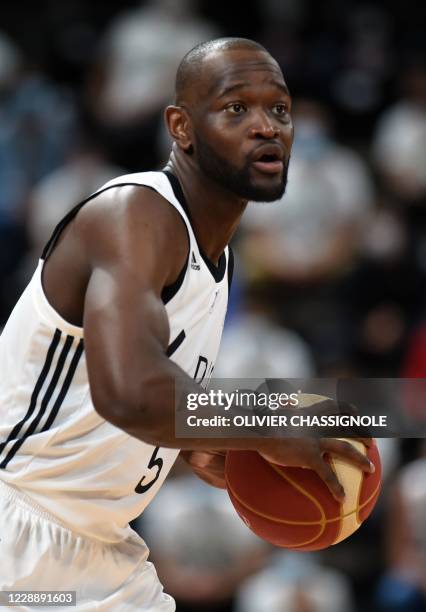 S French player Charles Kahudi controls the ball during the French Elite basket-ball championship match between ASVEL Lyon-Villeurbanne and...