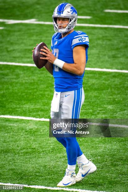 Matthew Stafford of the Detroit Lions warms up before the first quarter against the New Orleans Saints at Ford Field on October 4, 2020 in Detroit,...