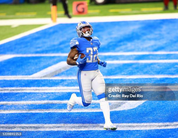Andre Swift of the Detroit Lions catches the ball for a touchdown in the first quarter against the New Orleans Saints at Ford Field on October 4,...