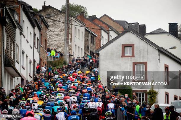 The pack rides during the Liege-Bastogne-Liege one day cycling race in Liege, on October 4, 2020 in Liege. / Belgium OUT