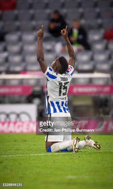 Jhon Cordoba of Hertha BSC celebrates after scoring the 2:1 during the Bundesliga match between FC Bayern Muenchen and Hertha BSC at Allianz Arena on...