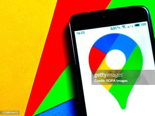 In this photo illustration a Google Maps logo is seen displayed on a smartphone.