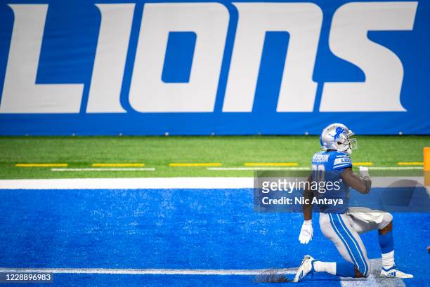 Adrian Peterson of the Detroit Lions celebrates a touchdown during the fourth quarter against the New Orleans Saints at Ford Field on October 4, 2020...