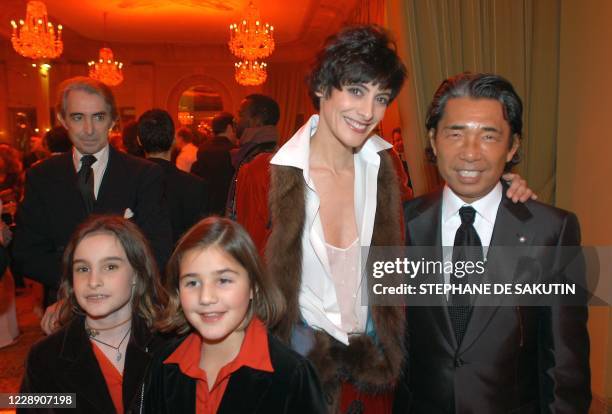 Top from right to left: the Japanese designer Kenzo, the former model Innès de La Fressange, her husband Luigi d'Urso, and bottom left: their...