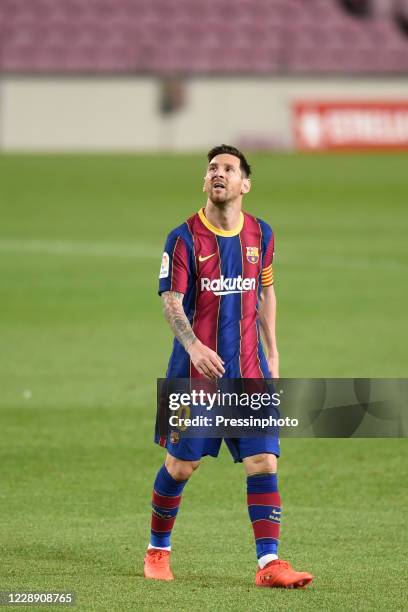 Lionel Messi of FC Barcelona looks to the score during the La Liga match between FC Barcelona and Sevilla FC played at Camp Nou Stadium on October 4,...