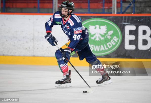 Lukas Reichel of the Eisbaeren Berlin handles the puck during the game between the Eisbaeren Berlin and HC Pardubice on august 30, 2019 in Berlin,...