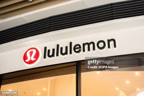 Canadian athletic apparel retailer, Lululemon logo seen at a store.