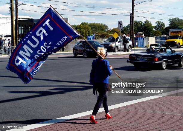 Supporters of US President Donald Trump gather outside Walter Reed National Military Medical Center on October 5, 2020 in Bethesda, Maryland. -...