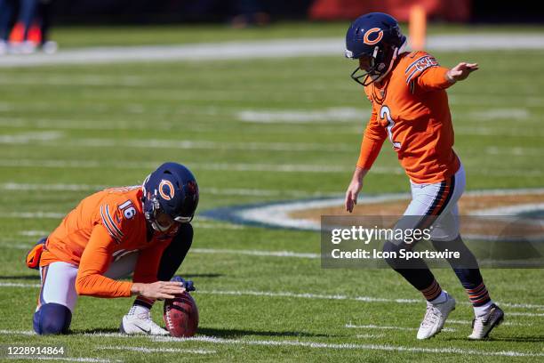 Chicago Bears Punter Pat O'Donnell and Chicago Bears Place Kicker Cairo Santos practicing a field goal kick prior to a NFL game between the Chicago...