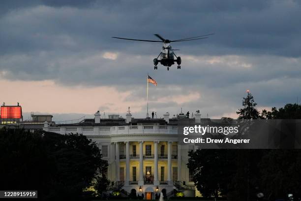 Marine One, with President Donald Trump onboard, prepares to land on the South Lawn of the White House on October 5, 2020 in Washington, DC. Trump is...